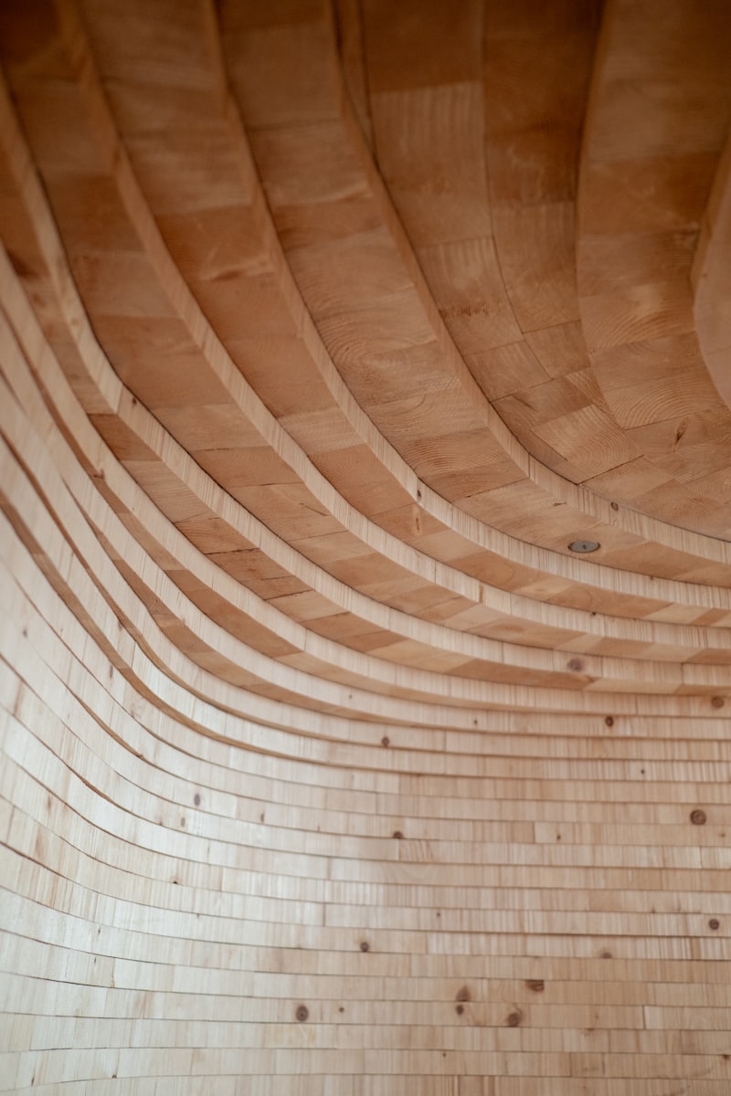 Wave-pattern lamella ceiling in a modern interior